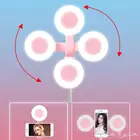 حامل جوال بإضاءه خلفيه وريموت للتصوير عم بعد