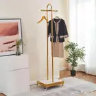 معلاق عبايات ذهبي. استاند عبايات ذهبي