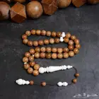 خشب ثمرة الكوك و عظم الجمل