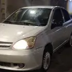 2003 Toyota Echo with a mileage of 348000 and a manual trans