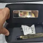 شنطة مكياج من افسان لوران مع عطر ليبر ابسلو بلاتين 10ملي