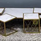 طاولة حديد ذهبي رخامه لون ابيض