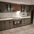 تفصيل وتصميم جميع انواع المطابخ علي احدث الموديلات العصرية