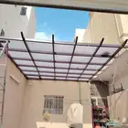 حداد مظلات وسواتر برجولات لكسان