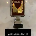 تمثال هايلوكس 88 احمر