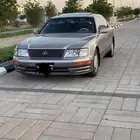 لكزس 97 امريكي. الموتر من شريته فيه تقط بالرفرف الايمن