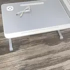 طاولة لابتوب ودروس