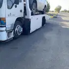 سطحة لنقل السيارات لي مكان