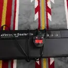 الة افراغ الهواء من الاكياس واغلاقها