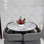 طاولة طعام اربعه كراسي جديده ونظيفه جدا  وطاولة مع خدماتها