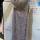 فستان لبس مرة وحده ومقاس 12 وتم تعديل عليه