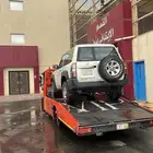 سطحه الرياض لنقل السيارات داخل وخارج الرياض