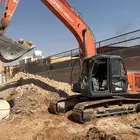 بوكلين حفر وهدم وترحيل