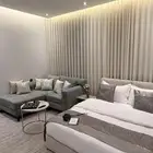 أستديو فندقي فاخر بجلسة جانبية للإيجار اليومي والأسبوعي