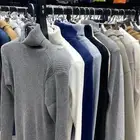 بلوفرات   سويترات للجنسين  .