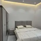 غرفة نوم جديده ونظيفه جدا وطاولت تلفزيون وكرسي كنب