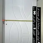 ابواب جديده خشب وباقي الاغراض شبه جديده
