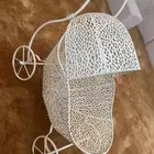 عربيه على شكل سرير اطفال لها كفر حديد