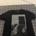 تيشيرت اسود مصور مستعمل مقاس M