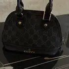 شنطة قوتشي