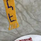 موداليات خرز بالاسامي