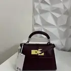 شنطة جديده من ماركة جوي بي لون ( برغندي ) حجم (ميني )