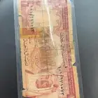 ريال الملك فيصل مغلف عالسوم