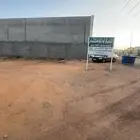حائل - حي الوادي أرض تجاريه زاوية للبيع تفتح على الشريان