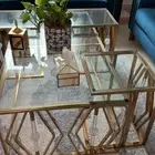 طاوله كبيره و 4 طاولات خدمة للبيع