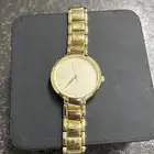 ساعة دكني ذهبي نسائيه