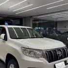 للبيع برادو TXL 2023 أبيض 6 سرندل (ممشى 1386 KM )وكاله نادر