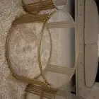 طاولات حديد مطلي باللون الذهبي