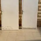 بابين خشب بدون اي مشاكل فيهم وا الطول 2