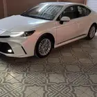 كامري 2025 ابيض نص فل فتحه بنزين Le