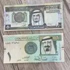 ريال توقيع احمد الخليفي 1587 و ريال الملك فهد يبداء 824