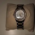 ساعة ذهبي مع فضي للبيع الرياض