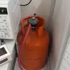 اسطوانة غاز مع الوصلة (الساعة)