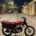 AX100جنشي
