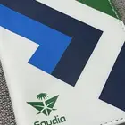 حامل جواز سفر بهوية الخطوط السعوديه الجديده