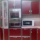 مطبخ بلون اسود واحمر عنابي كامل بجميع الاجهزه للبيع