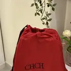 شنطة CH بلون فوشي محمر