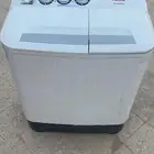 غسالة ومكنستين