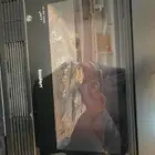 طاولة تلفزيون مع ديكور دفايه