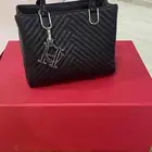شنطة كارولينا هريرا   مع محفظة