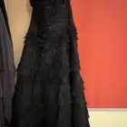 فستان سهرة اسود مقاس 12 (L) تم استعماله مره واحده