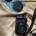 كانون اي أو اس آر 100 كاميرا بدون مرآة ميرورليس