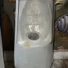 كشافات كبيرة حديد قوي من النوع القديم. مكينة قص العشب أصلية