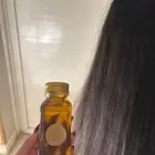 زيت تطويل وتنعيم الشعر