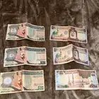 عملات قديمه وفيه منها عليها توقيع احمد حنيف