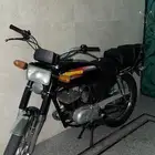 سزوكي AX100